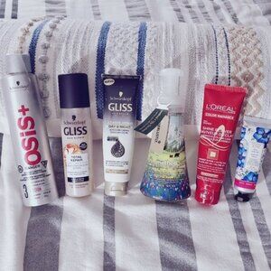 Hair Care Product Set with Red, Black, and White Packaging